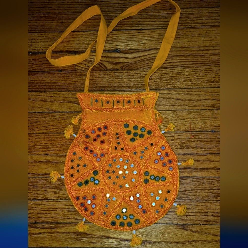 Ethnic Marigold Colored Bag- Sun, Flower, Mirror Like, Embroidered With Tassels